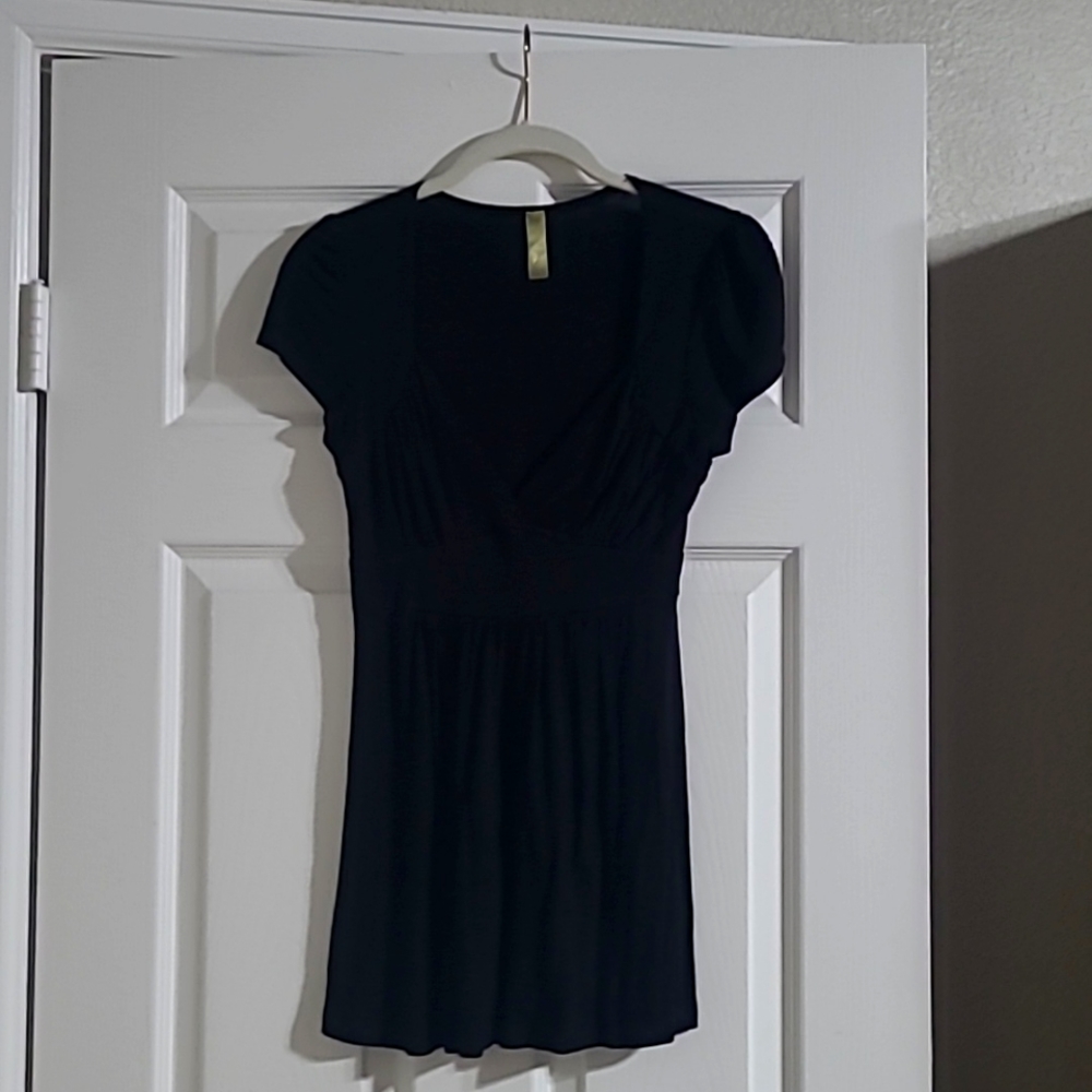 Medium size black baby doll style top by Lush